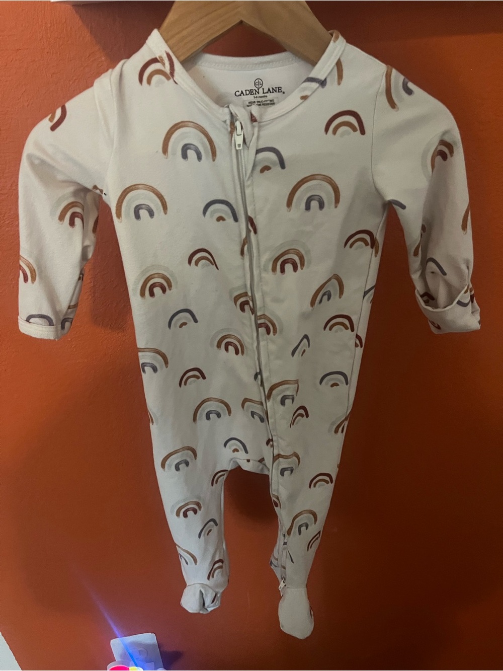 Caden Lane Cream Footed One-Piece with Brown & Blue Rainbows